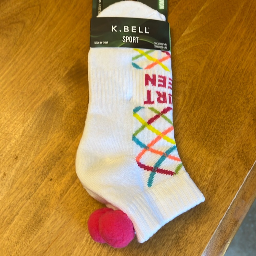 K bell brand new tennis socks Pom poms on back